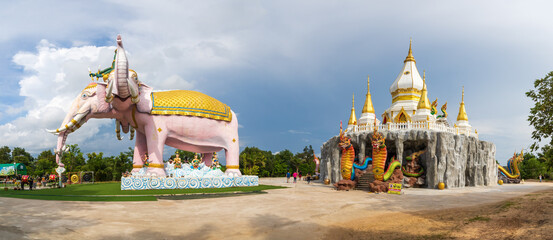 Mukdahan, Thailand - July 31, 2022: large 3-headed elephant statue, Naga at the entrance of the...