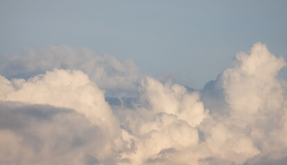 Puff Clouds in the Sky during sunset. Zoom in. Cloudscape Background. British Columbia, Canada.