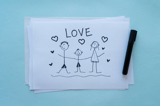 Drawing of a happy family with the inscription "love". Dad, mom and son