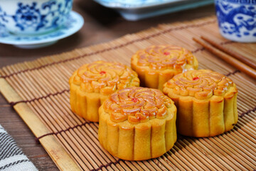 Mooncake for Mid Autumn Festival. Traditional Chinese pastry Moon cake for Chinese Moon festival. Selective focus, copy space