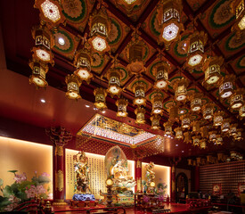 Fototapeta premium The statues of Buddha at The Buddha Tooth Relic Temple, Singapore.