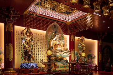 Fototapeta premium The statues of Buddha at The Buddha Tooth Relic Temple, Singapore.