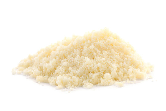 Pile of grated parmesan cheese isolated on white