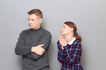 Shot of adult couple after quarrel or unpleasant conversation