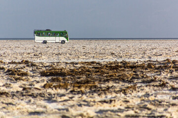 Small bus at the salt flats of Danakil depression, Ethiopia