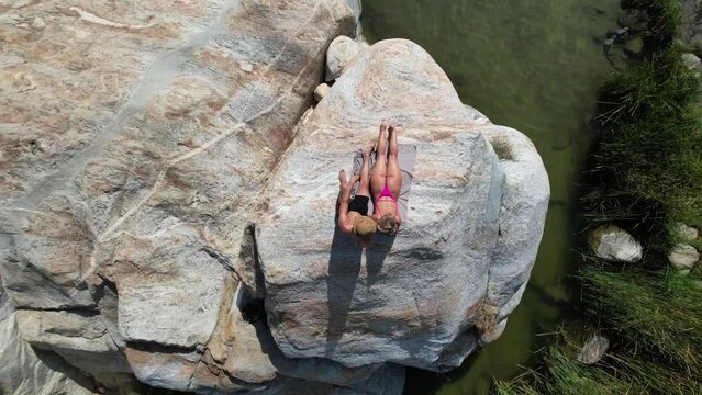 couple hikes on girant rock in a hiden oasis with tropical waterfall cobo san lucus mexico