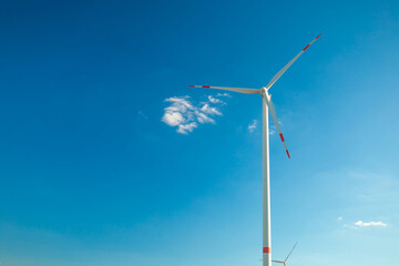 Fototapeta premium Wind energy.Alternative natural energy source. Wind energy price.Green renewable energy cost