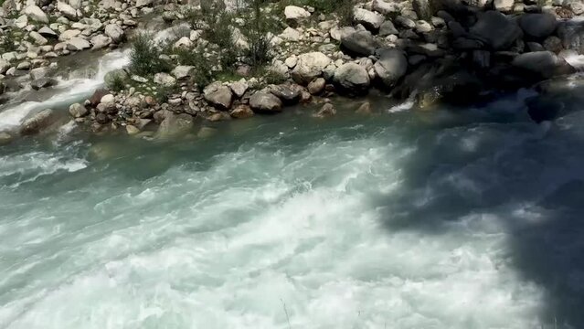 River flowing in Kalam Swat valley along a dirt road to Mahodand lake
