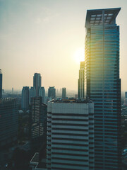 High rise with sunrise background in the Jakarta