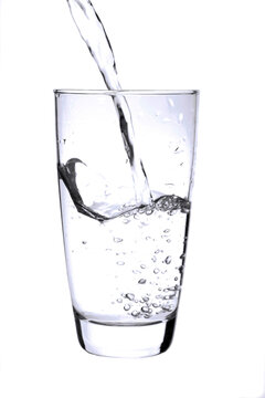 pouring a glass o water transparent 