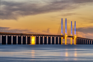 The famous Oresund bridge between Denmark and Sweden after sunset