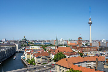 View of Berlin Mitte with the famous TV Tower, the cathedral and the town hall on a sunny day