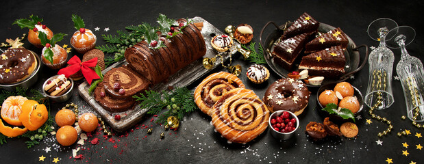 Traditional Christmas dessert on dark background.