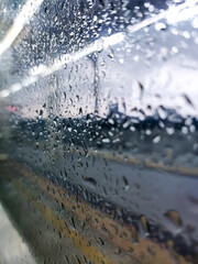 water drops on the window. heavy rain in Jakarta.