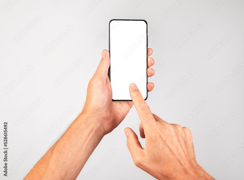 Poster Forefinger clicking ok at phone mockup. Woman holding template with blank display in vertical position. Empty space for adding content