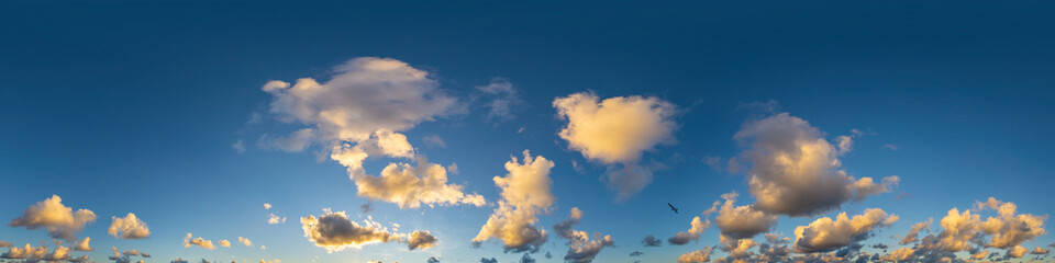 Dark blue sunset sky panorama with Cumulus clouds. Seamless hdr pano in spherical equirectangular format. Complete zenith for 3D visualization, game and sky replacement for aerial drone 360 panoramas.