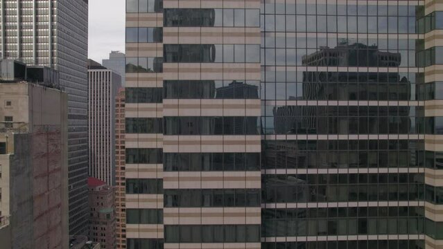Working hours in the office building. Drone flight around the office skyscraper
