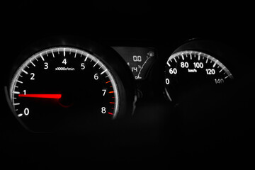 The car dashboard with a speedometer