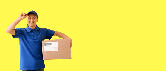 Delivery man with parcel on yellow background with space for text