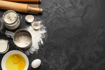 Different ingredients for baking on dark background