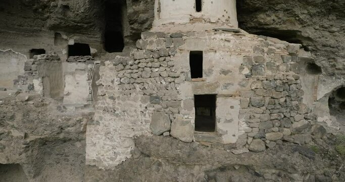 Remains Of The Vanis Kvabebi Cave Monastery In Samtskhe-Javakheti Region Of Georgia - aerial pullback