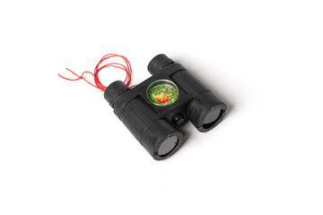 Plastic black toy binoculars isolated on white background