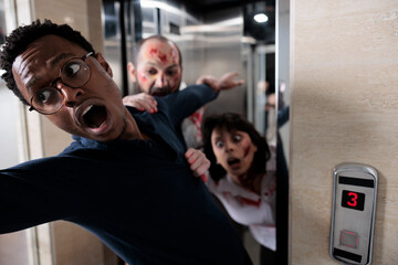 Frightened adult running from cruel walkers escaping office elevator, brain eating walking dead...