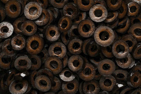 Sliced black olives as background
