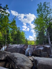 Diana's Baths waterfall on rocks with trees in New Hampshire