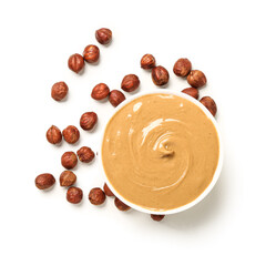 Bowl of tasty hazelnut butter and nuts isolated on white background