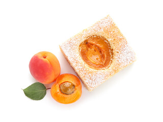 Piece of tasty apricot pie and fresh fruits on white background