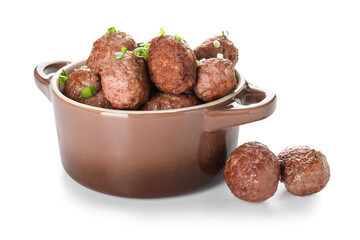 Cooking pot with tasty meat balls and cut green onion on white background