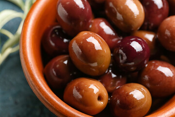 Bowl of delicious olives, closeup