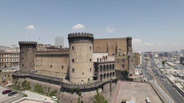 Castel Nuovo, Naples, Italy. Aerial backward of the castle and Via Ammiraglio Ferdinando Acton