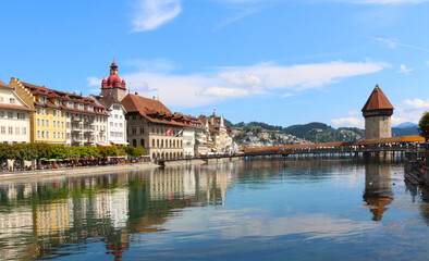 Old town of Lucerne with the covered wooden footbridge Chapel Bridge spanning the river Reuss,...