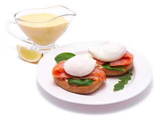 Cream cheese, Smoked salmon and poached egg toasts on a plate