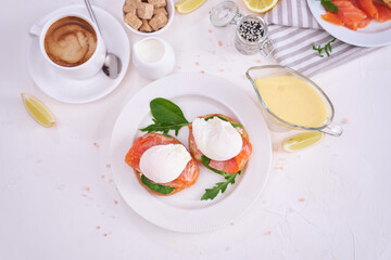 Cream cheese, Smoked salmon and poached egg toasts on a plate