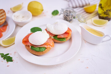 Cream cheese, Smoked salmon and poached egg toasts on a plate