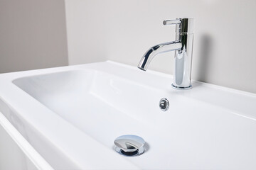 Bathroom interior modern design sink. Interior of bathroom with washbasin and faucet elongated...