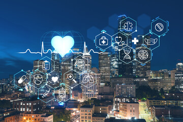 Illuminated aerial cityscape of Seattle, downtown at night time, Washington, USA. Health care digital medicine hologram. The concept of treatment and disease prevention