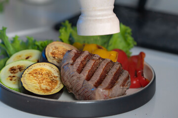 a piece of meat steak grilled