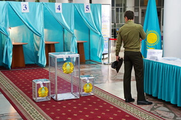 Almaty, Kazakhstan - 06.05.2022 : Citizens vote in a referendum at their polling station.