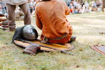 Festival of historical reconstruction and medieval battle in the open air. Close-up of an ancient...