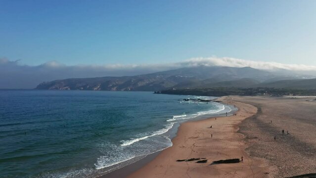 Drone flying over Do Guincho beach in Portugal