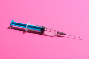 Disposable plastic syringe prepared for injection and vaccination in the hospital. The concept of...