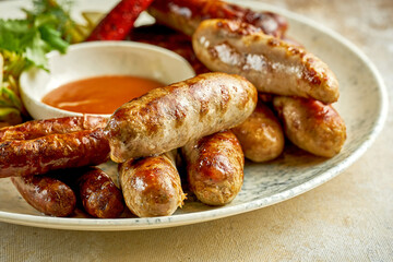 German grilled sausages. Close-up selective focus. An appetizer for beer