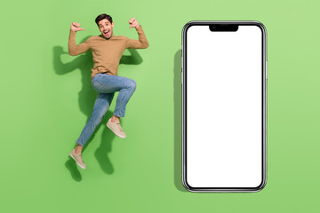 Fototapeta na wymiar Full length photo of excited crazy handsome guy direct thumbs on self isolated on green color background