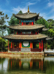 the Moon Embracing Pavilion in the Jade Spring Park, Lijiang, China.