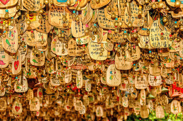 Hanging sign for pray at Lijiang Old Town in Lijiang Yunnan, China