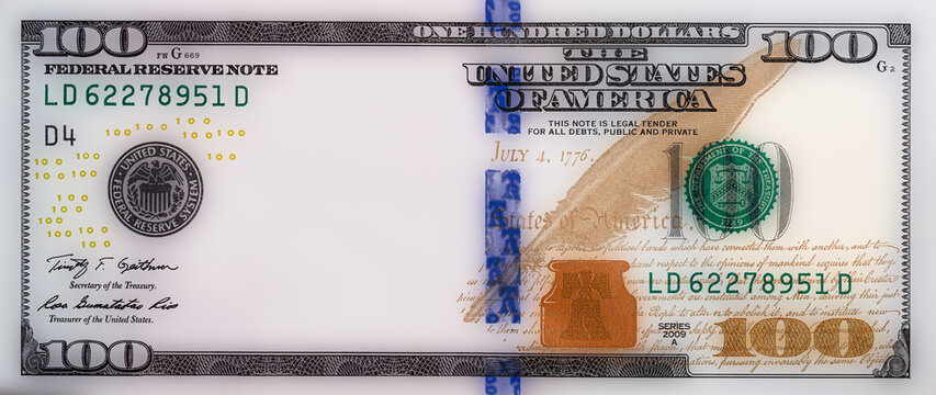 blurred U.S. 100 dollar banknote